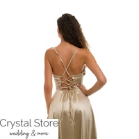 Kép 2/2 - Corset fűzős hátú, A-vonalú sliccelt fényes maxiruha, champage